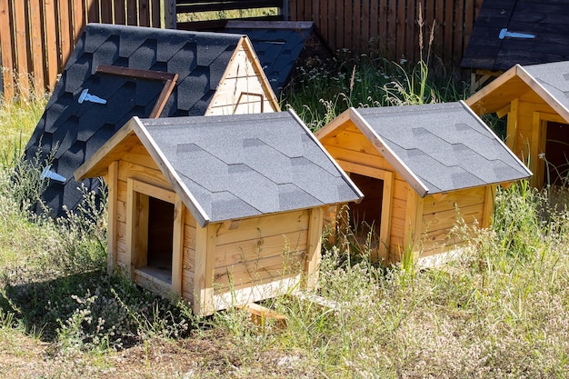 Wooden booth for a dog in the yard