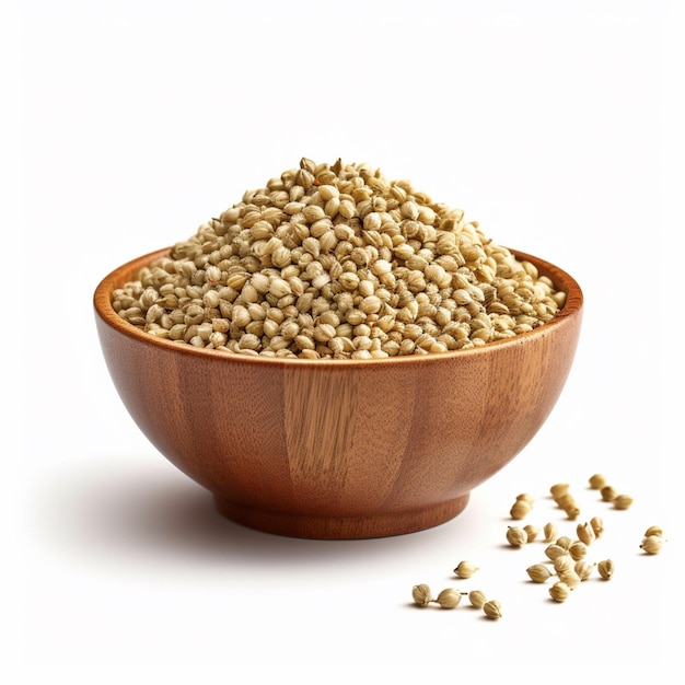 A wooden bowl of coriander seeds sits next to a pile of seeds.