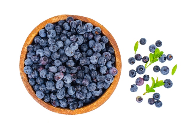 Wooden bowl with blueberries