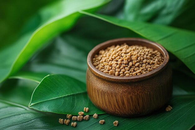 a wooden bowl with a few seeds in it and some green leaves