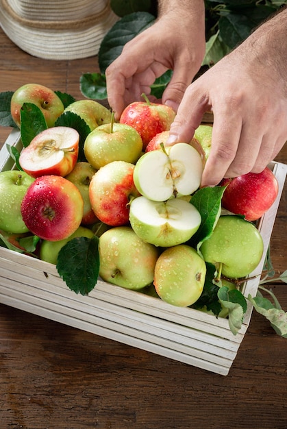 Wooden box with full of different apples