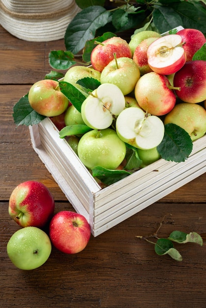 Wooden box with full of freshly picked apples