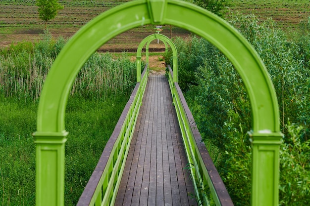 Wooden bridge across the river