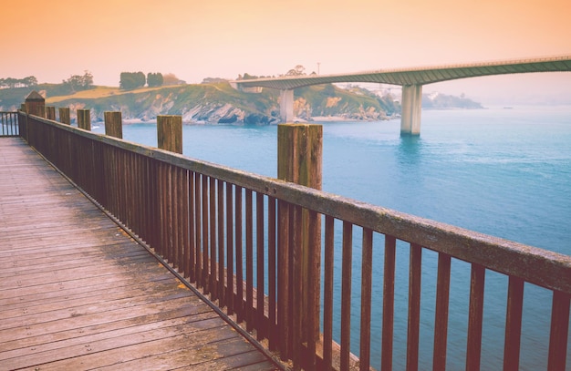 Wooden bridge over the river View from O Cargadoiro of Ribadeo Spain