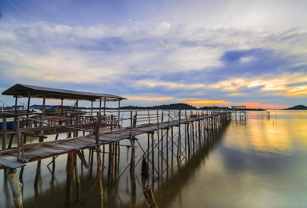 wooden bridge at sunset in the fishing village