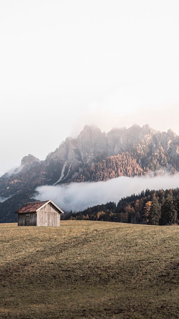 Wooden cabin in the hills near the Dolomites, Italy