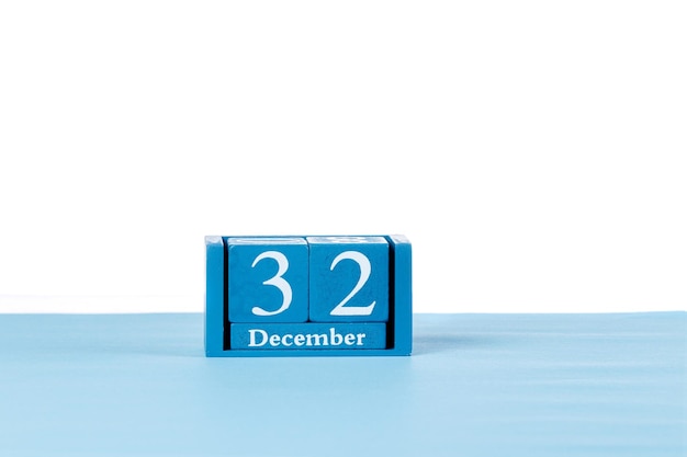 Wooden calendar December 32 on a white background