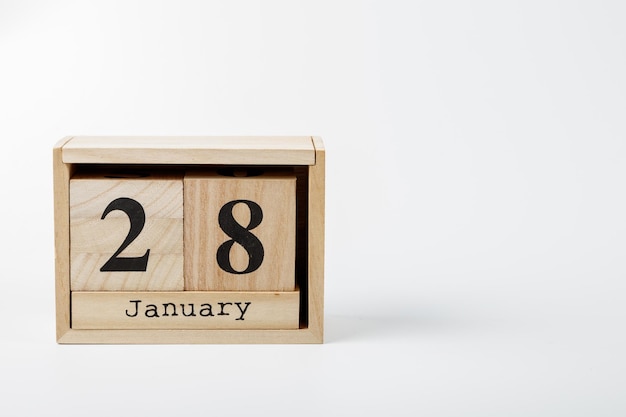 Wooden calendar January 28 on a white background