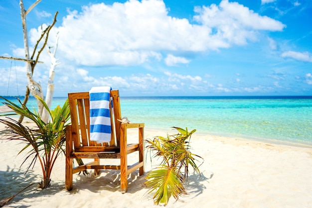 A wooden chair standing on the coast Indian Ocean