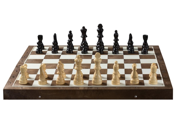 Wooden chess pieces on board on white isolated background Starting of chess game