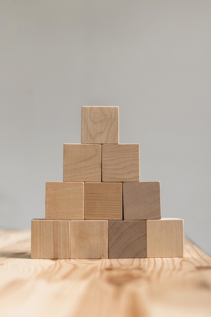 Wooden children's blocks on a wooden background