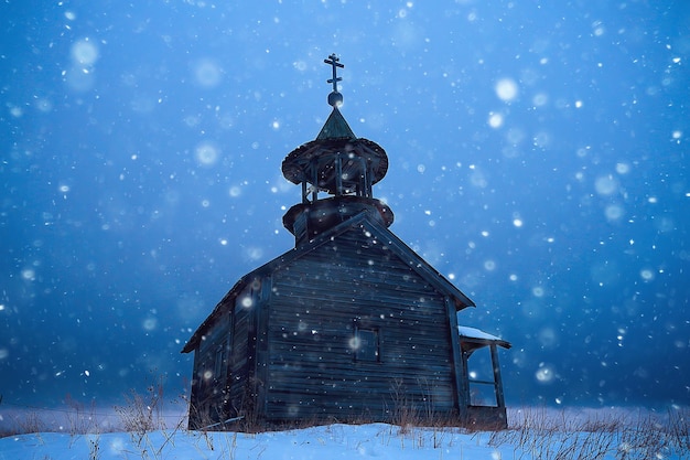 wooden church in Finland / winter landscape in Scandinavia view of the wooden church, old architecture