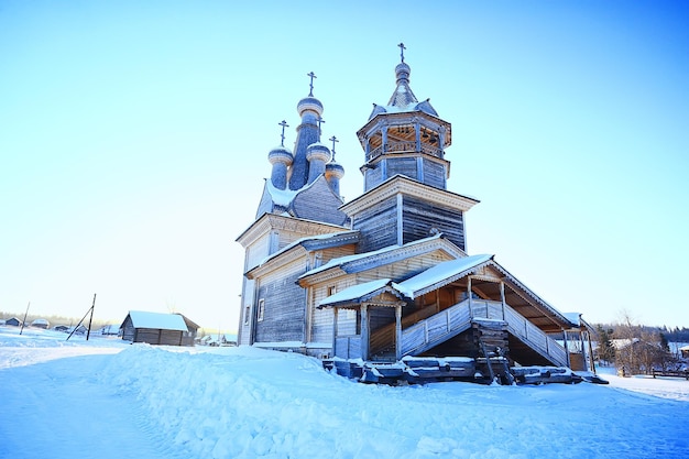 wooden church in the Russian north landscape in winter, architecture historical religion Christianity