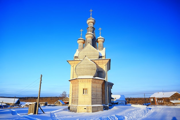 wooden church in the Russian north landscape in winter, architecture historical religion Christianity