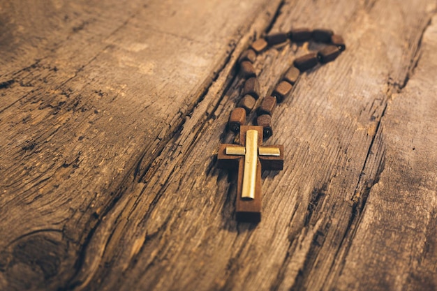 Wooden cross on the table