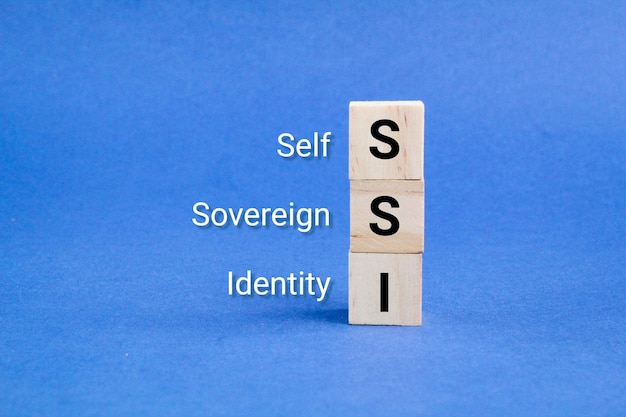 wooden cube with the letters SSI or the word self-sovereign identity