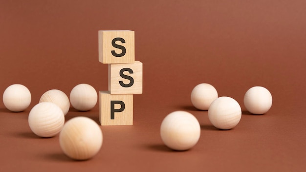 Wooden cubes block with alphabet combine abbreviation SSP ssp short for Sell Side Platform