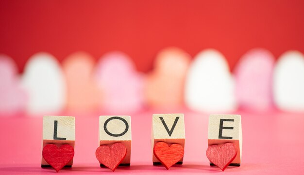 wooden cubes with hearts and letters