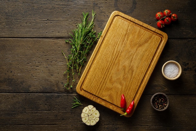 Wooden cutting board food seasoning background spices herbs recipe mock up copy space