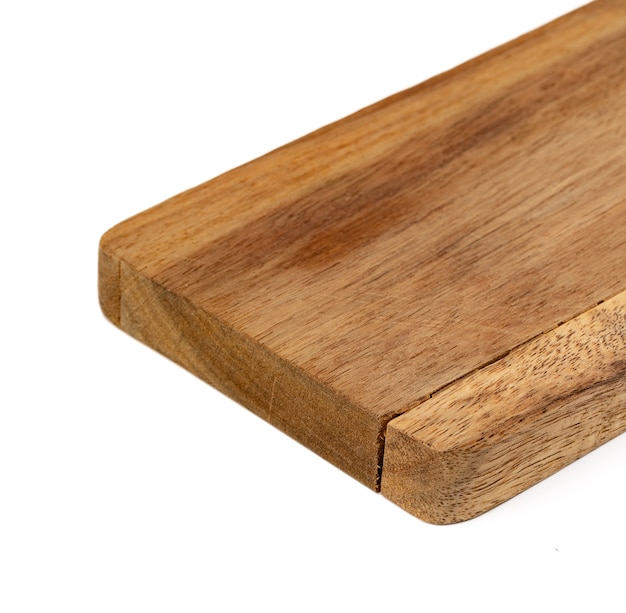 Wooden cutting board on a white background