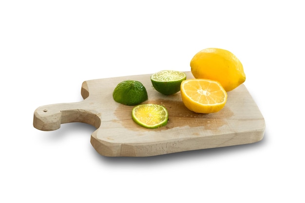 Wooden cutting board with lemon on a white background