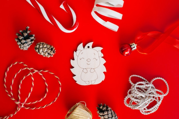 Wooden decoration on the Christmas tree in the form of a hedgehog 