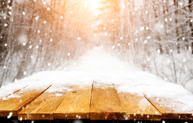 Wooden desk covered by snow