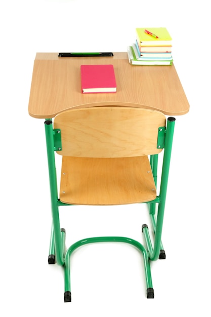 Photo wooden desk with stationery isolated on white