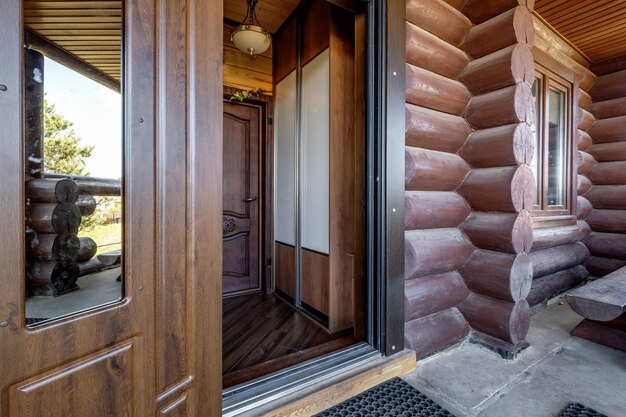 Wooden doors to a country log house