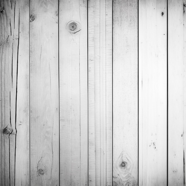 A wooden fence with white wood planks and a black and white background.