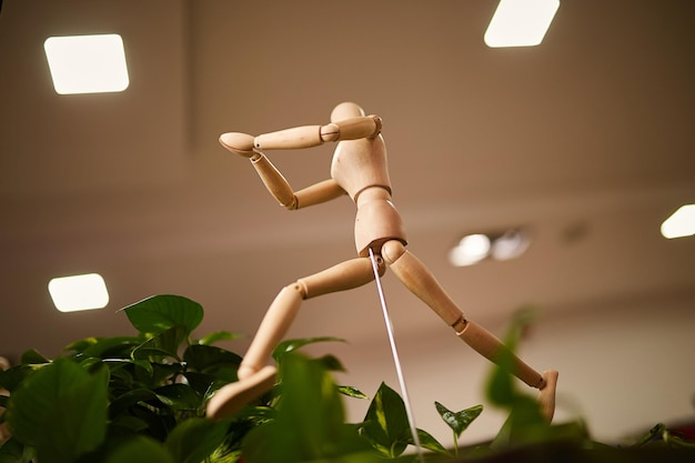 wooden figure of a running man