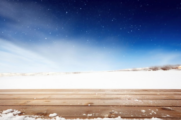 Photo wooden floor against snowy landscape under blue sky with snowflakes