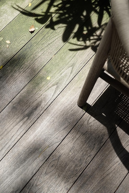 Photo wooden floor exterior gray brown outdoor with floral plant shadow minimal aesthetics shot design