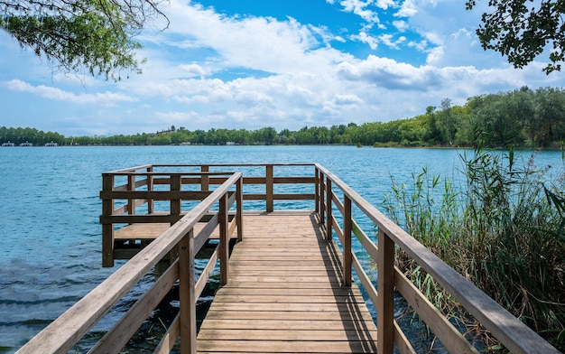 Wooden footbridge with views of Banyoles lake