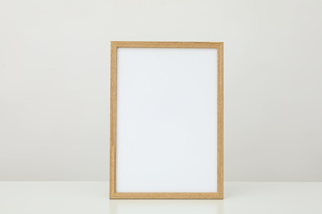 Wooden frame with blank area on light background