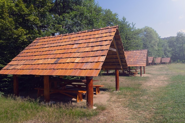 Wooden gazebo or pavilion in the forest open air