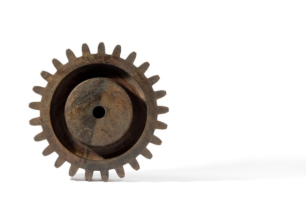 Wooden gear isolated on white background