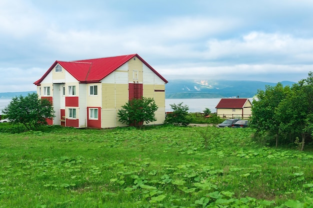 Wooden house in a fishing town on the shore of the sea bay