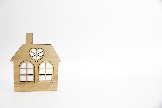 Wooden house icon isolated on white background with copy space, real estate, new home and mortgage concept