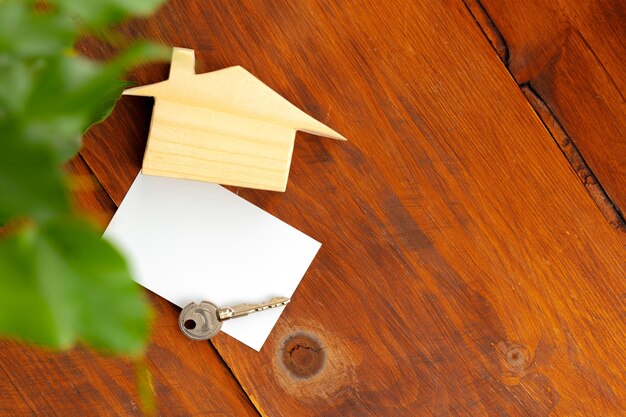 Wooden house model miniature and house keys