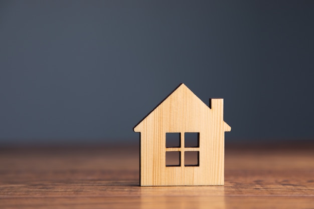 wooden house model on the table.