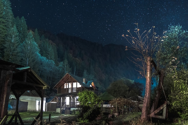 Wooden house at night 