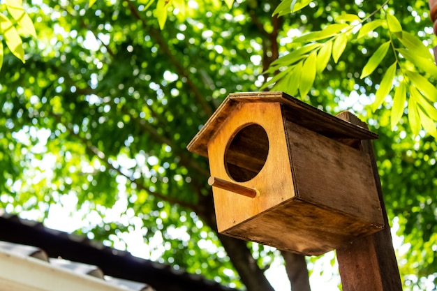 Wooden houses for the birds in your garden decoration.