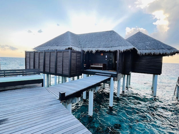 A wooden jetty in a luxury resort baa atoll maldives