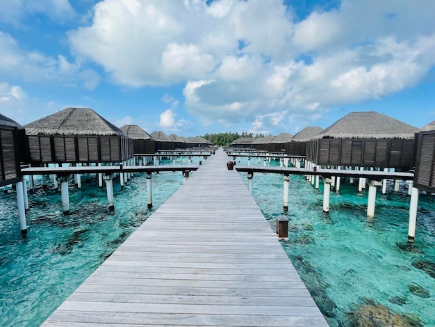 A wooden jetty in a luxury resort baa atoll maldives