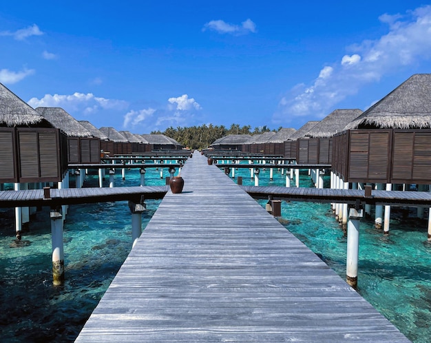 A wooden jetty in a luxury resort Maldives