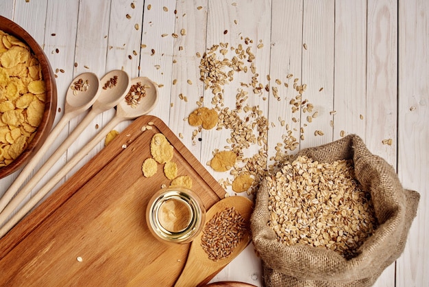 Wooden kitchen items food muesli view from above