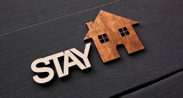 Wooden little house and the word stay