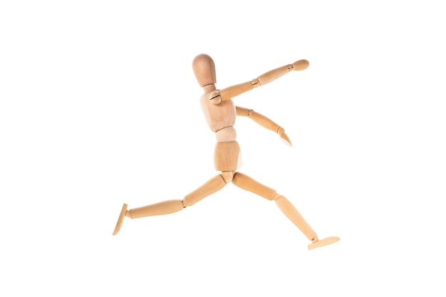 Wooden man running arms outstretched isolated on white background High quality photo