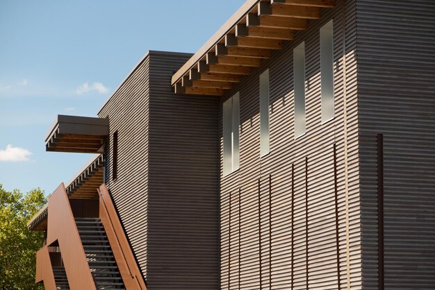 Wooden office building under a blue sky